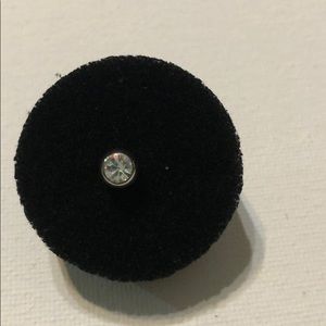 Body jewelry tongue bar.